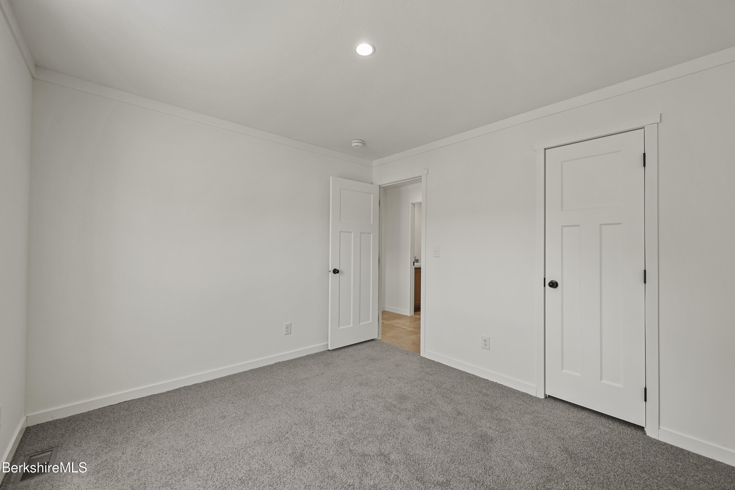 395 Cheshire Road, Unit 112 Pittsfield, MA 01201 - Photo 29 of 32 a view of an empty room