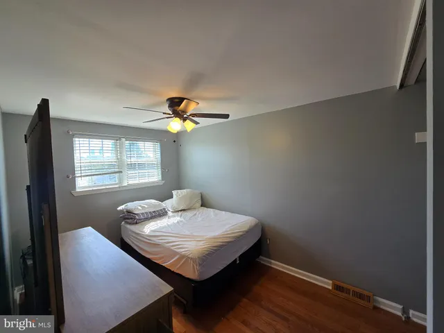 a view of a room that has a table and chair