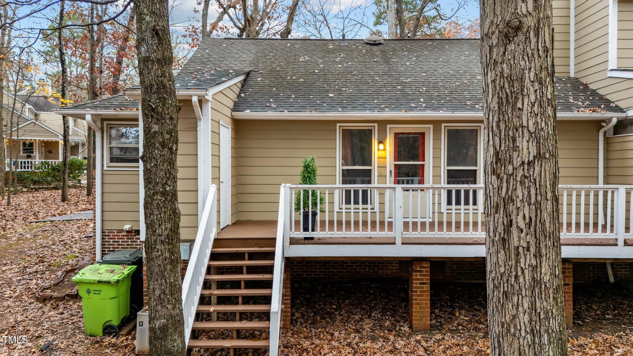 906 Bridge Way Raleigh, NC 27615 - Photo 27 of 30 front view of a house with wooden fence and windows