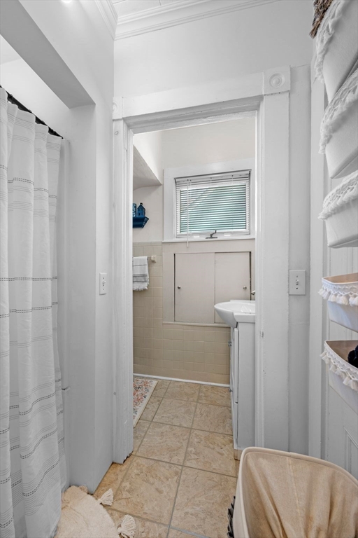 36 Stone Street Beverly, MA 01915 - Photo 12 of 42 a bathroom with a sink and shower