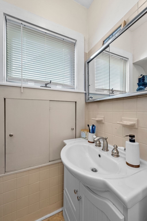 36 Stone Street Beverly, MA 01915 - Photo 13 of 42 a bathroom with a sink and a mirror