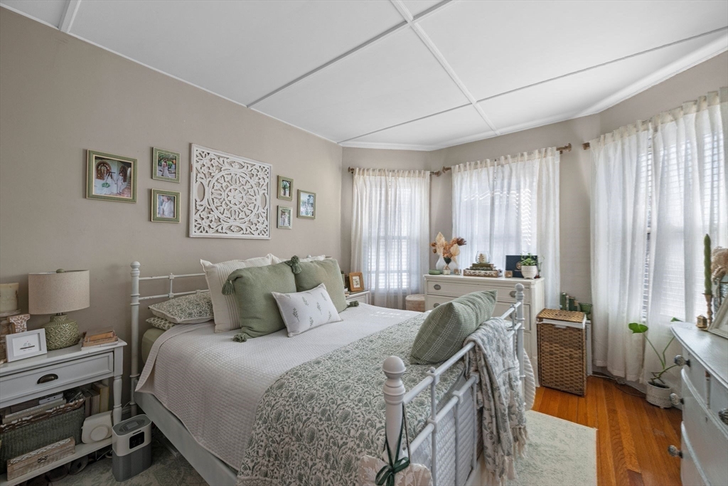 36 Stone Street Beverly, MA 01915 - Photo 15 of 42 a bedroom with a bed and a desk in it