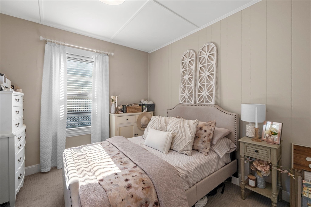 36 Stone Street Beverly, MA 01915 - Photo 17 of 42 a bedroom with a bed and a window