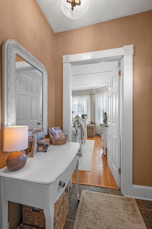 36 Stone Street Beverly, MA 01915 - Photo 18 of 42 a living room with furniture and a wooden floor
