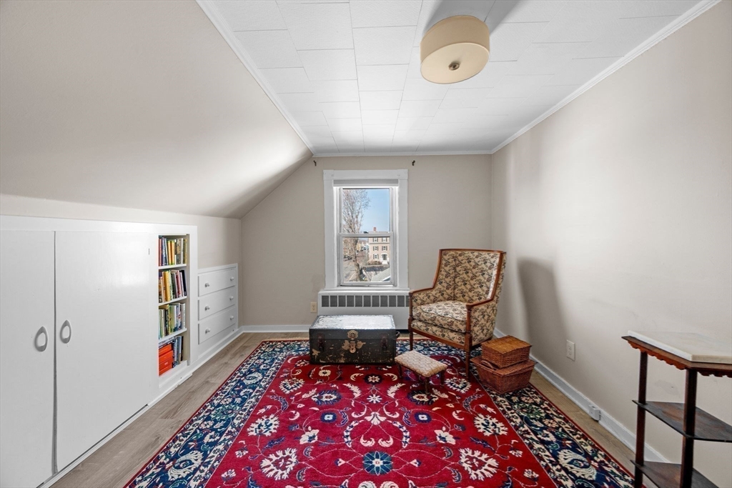 36 Stone Street Beverly, MA 01915 - Photo 26 of 42 a living room with furniture and a window