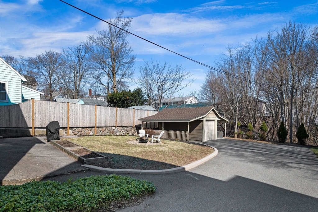36 Stone Street Beverly, MA 01915 - Photo 3 of 42 a view of a house with backyard and sitting area