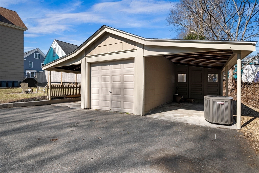 36 Stone Street Beverly, MA 01915 - Photo 7 of 42 front view of a house with a garage