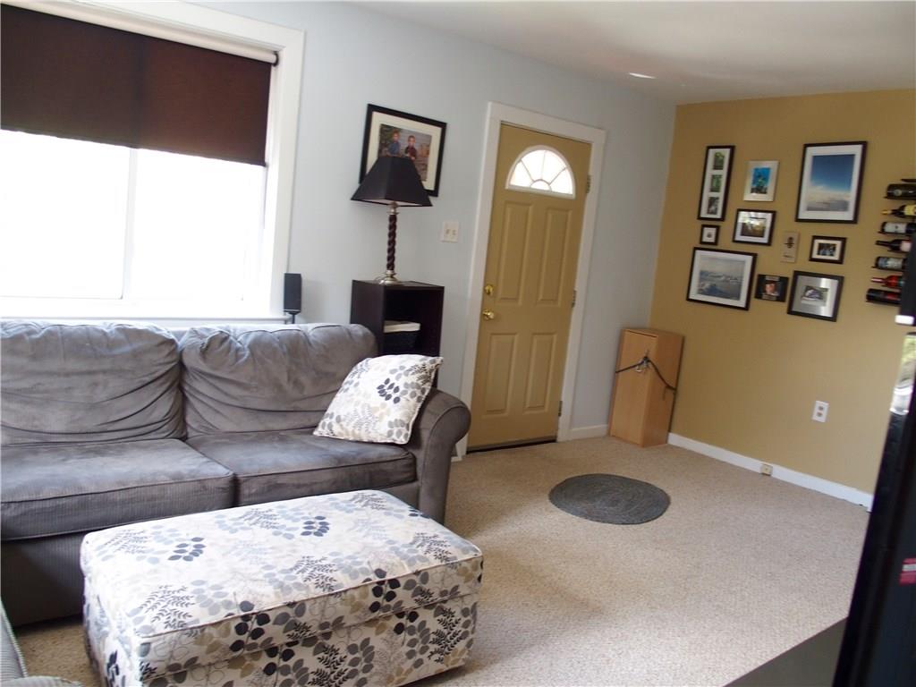 168 Altman Road Jeannette, PA 15644 - Photo 14 of 15 This living room is spacious and inviting, room for your large flat screen too!