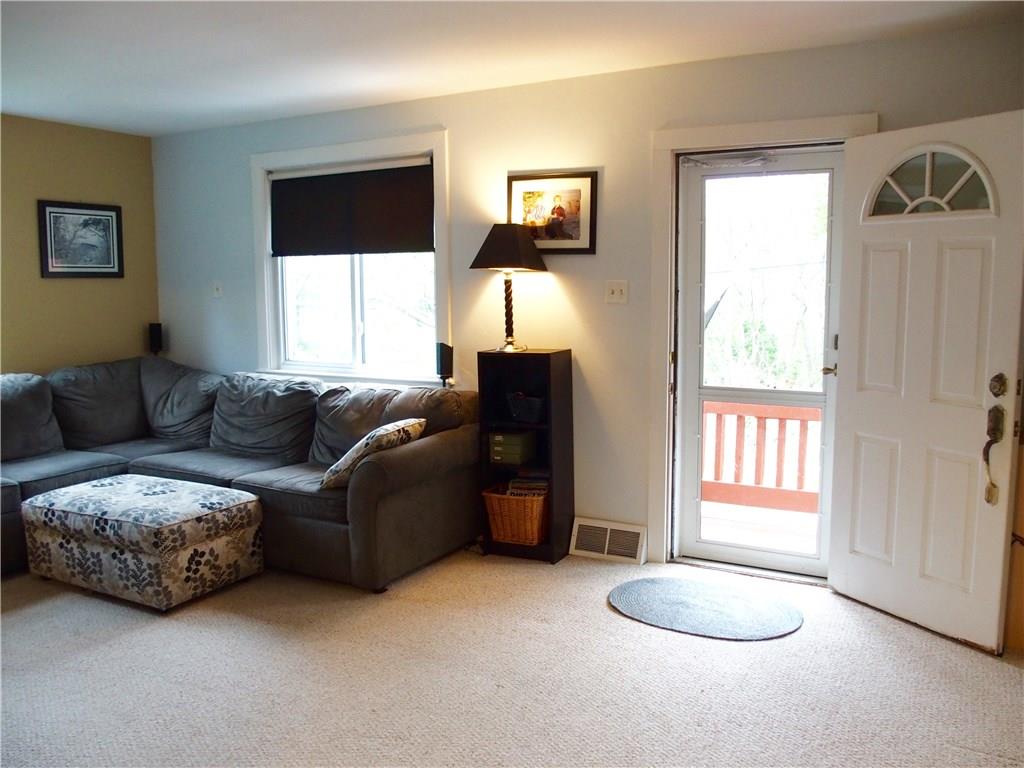 Your guests are welcomed through the front door into your living room.