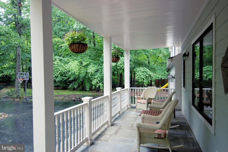 600 Utterback Store Road Great Falls, VA 22066 - Photo 3 of 30 a view of a two chair in the balcony