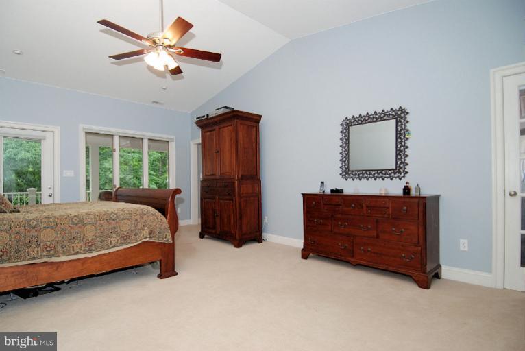 600 Utterback Store Road Great Falls, VA 22066 - Photo 8 of 30 a bed room with a bed and a window