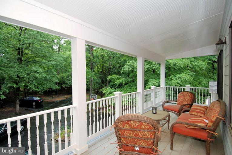 600 Utterback Store Road Great Falls, VA 22066 - Photo 9 of 30 a view of a two chairs in the deck