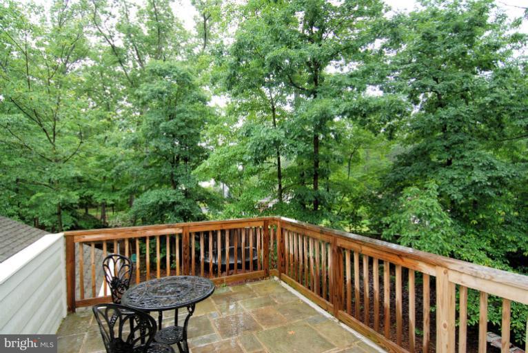 600 Utterback Store Road Great Falls, VA 22066 - Photo 10 of 30 a view of balcony with a wooden fence and floor
