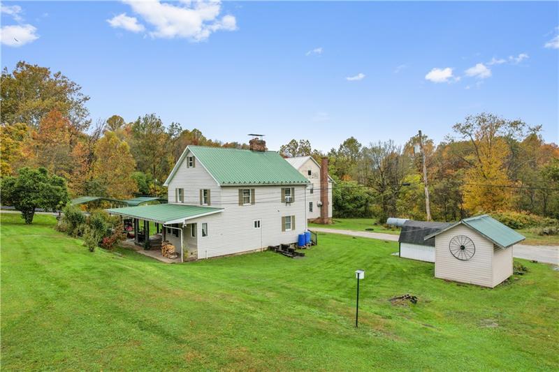 218 Outcrop Road Smithfield, PA 15478 - Photo 5 of 21 a view of a house with a big yard