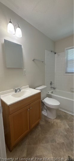 1070 Rulnick Street Fayetteville, NC 28304 - Photo 11 of 15 a bathroom with a toilet sink and mirror