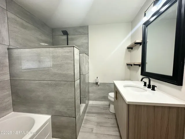 a bathroom with a sink and a bathtub