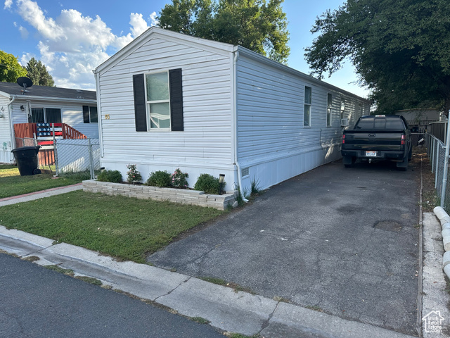 1375 West 500th North, Unit 95 Provo, UT 84601 - Photo 16 of 19 Manufactured / mobile home featuring asphalt driveway