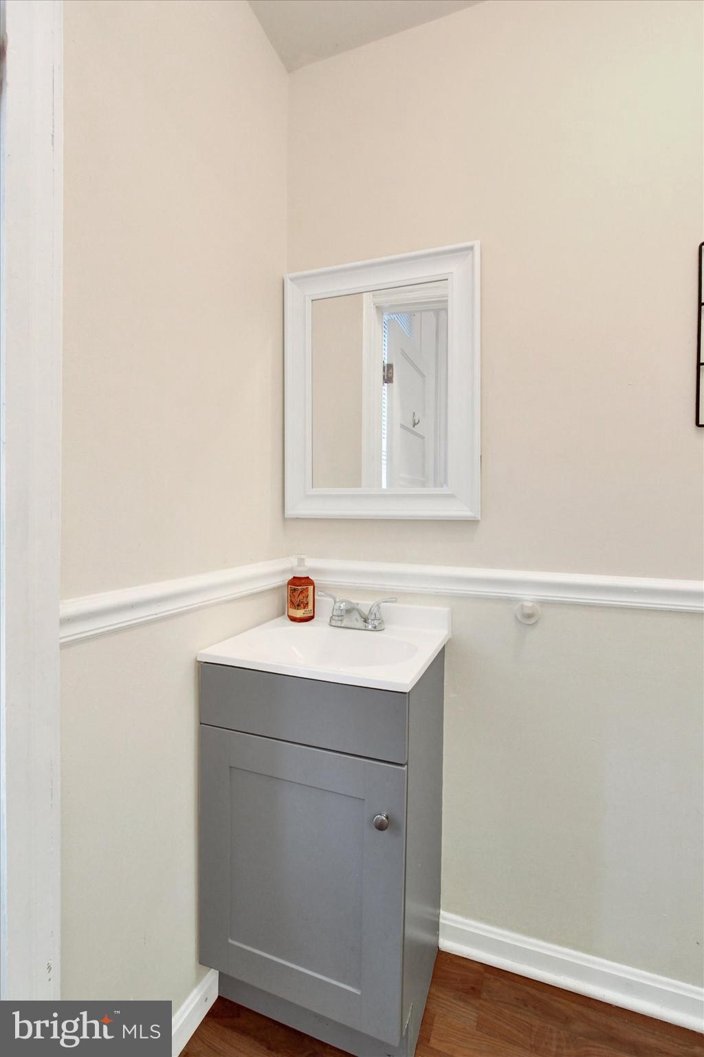 614 Broadway Hanover, PA 17331 - Photo 13 of 33 a view white cabinet with wooden floor