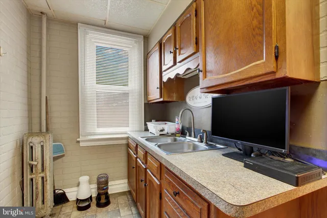 a bathroom with a sink double vanity and a mirror