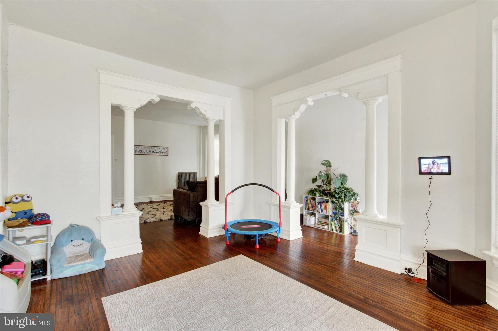 614 Broadway Hanover, PA 17331 - Photo 6 of 33 a living room with furniture and wooden floor