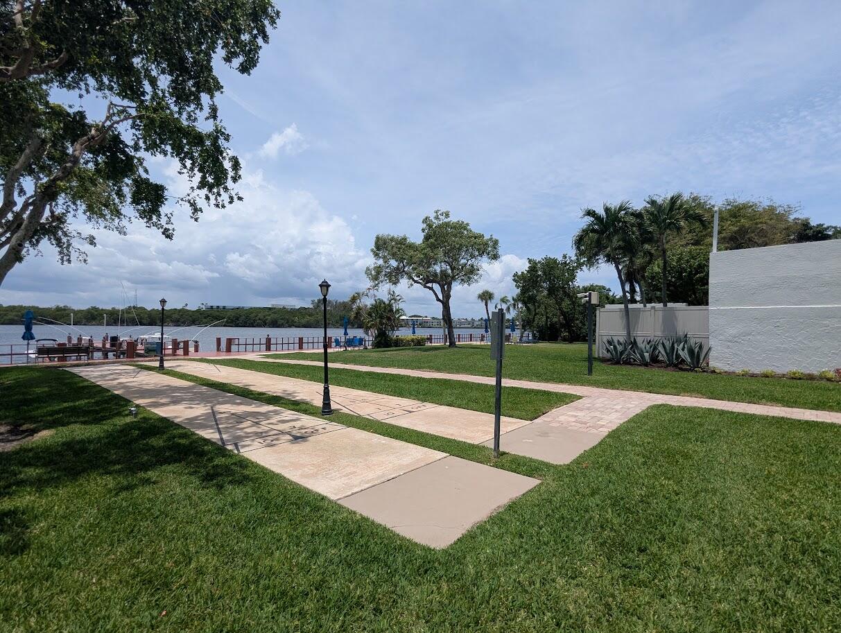 2121 North Ocean Boulevard, Unit 1006E Boca Raton, FL 33431 - Photo 54 of 64 a view of a park with large trees