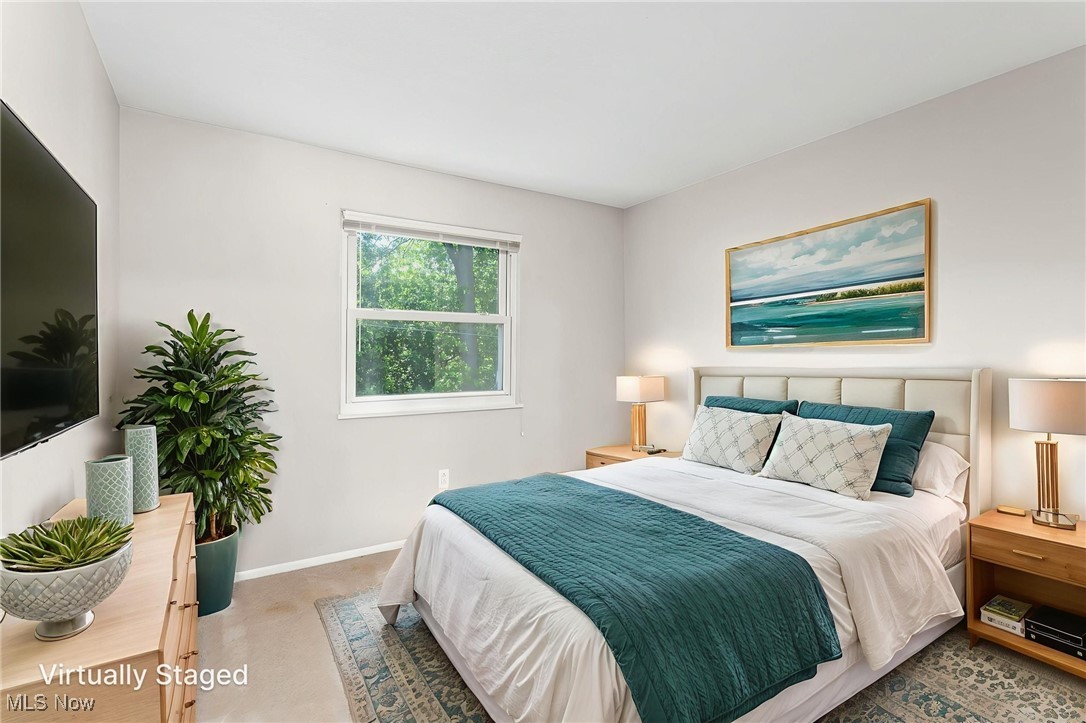6480 State Road, Unit F7 Parma, OH 44134 - Photo 23 of 33 Virtually Staged Bedroom featuring baseboards