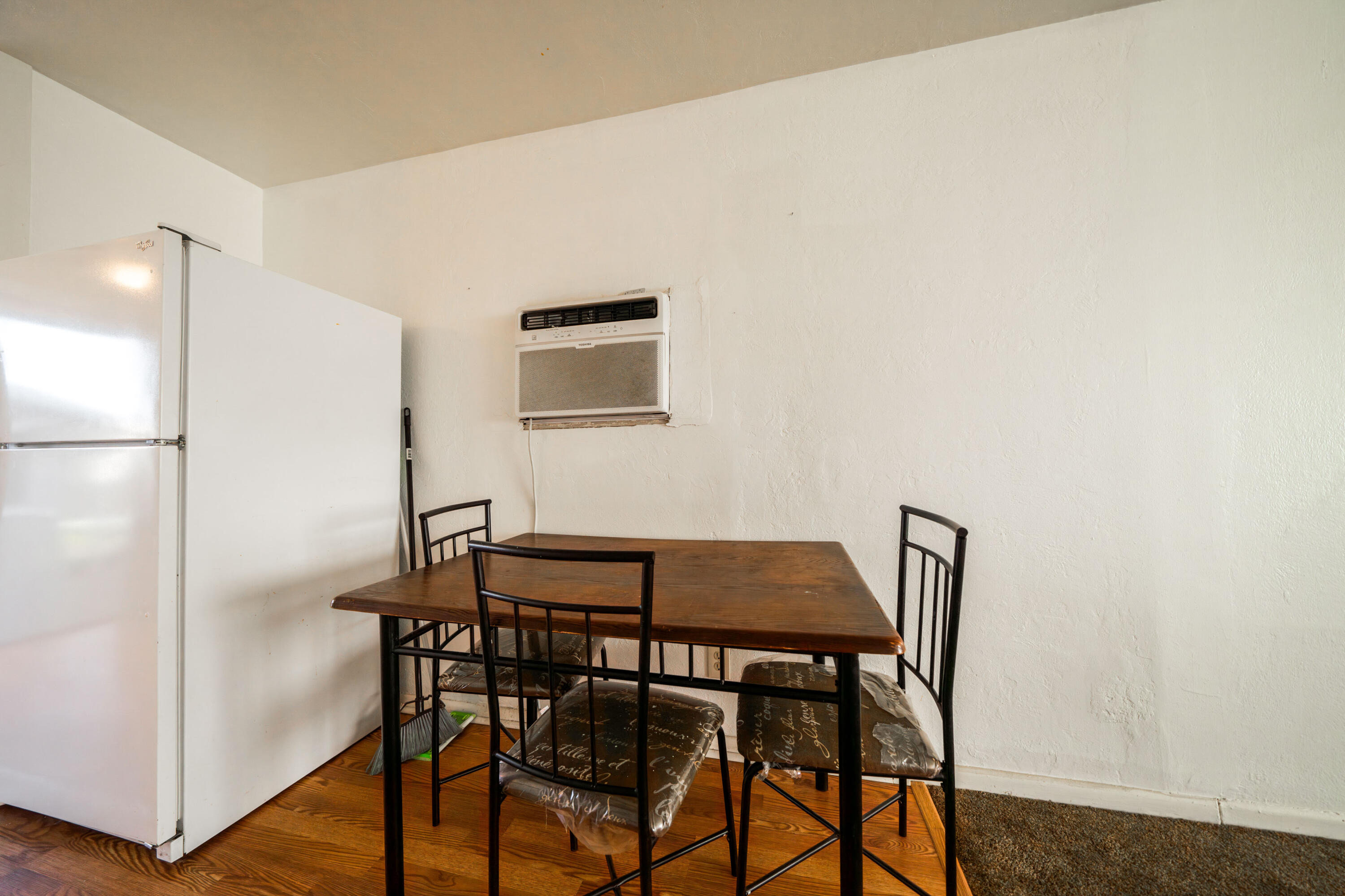 240 Kimball Road Red Bluff, CA 96080 - Photo 17 of 56 a view of a dining room with furniture and wooden floor