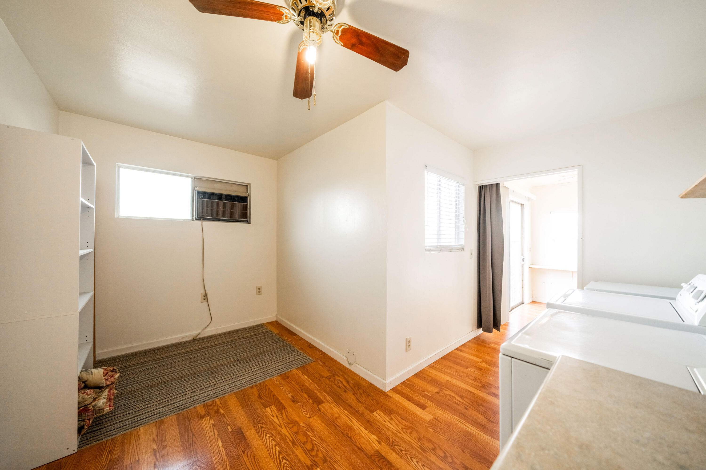 240 Kimball Road Red Bluff, CA 96080 - Photo 20 of 56 a bedroom with a bed and a chandelier fan