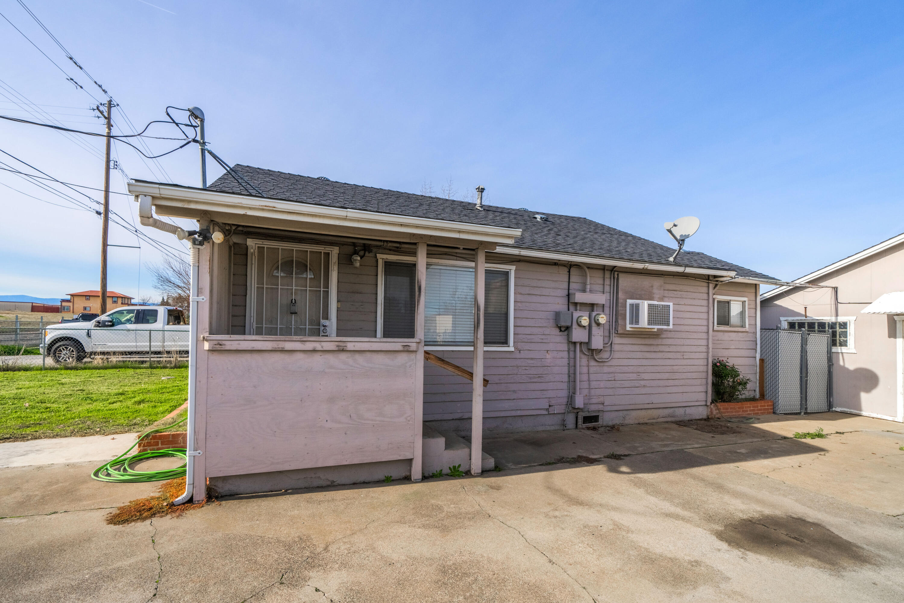 240 Kimball Road Red Bluff, CA 96080 - Photo 3 of 56 a front view of a house with a yard