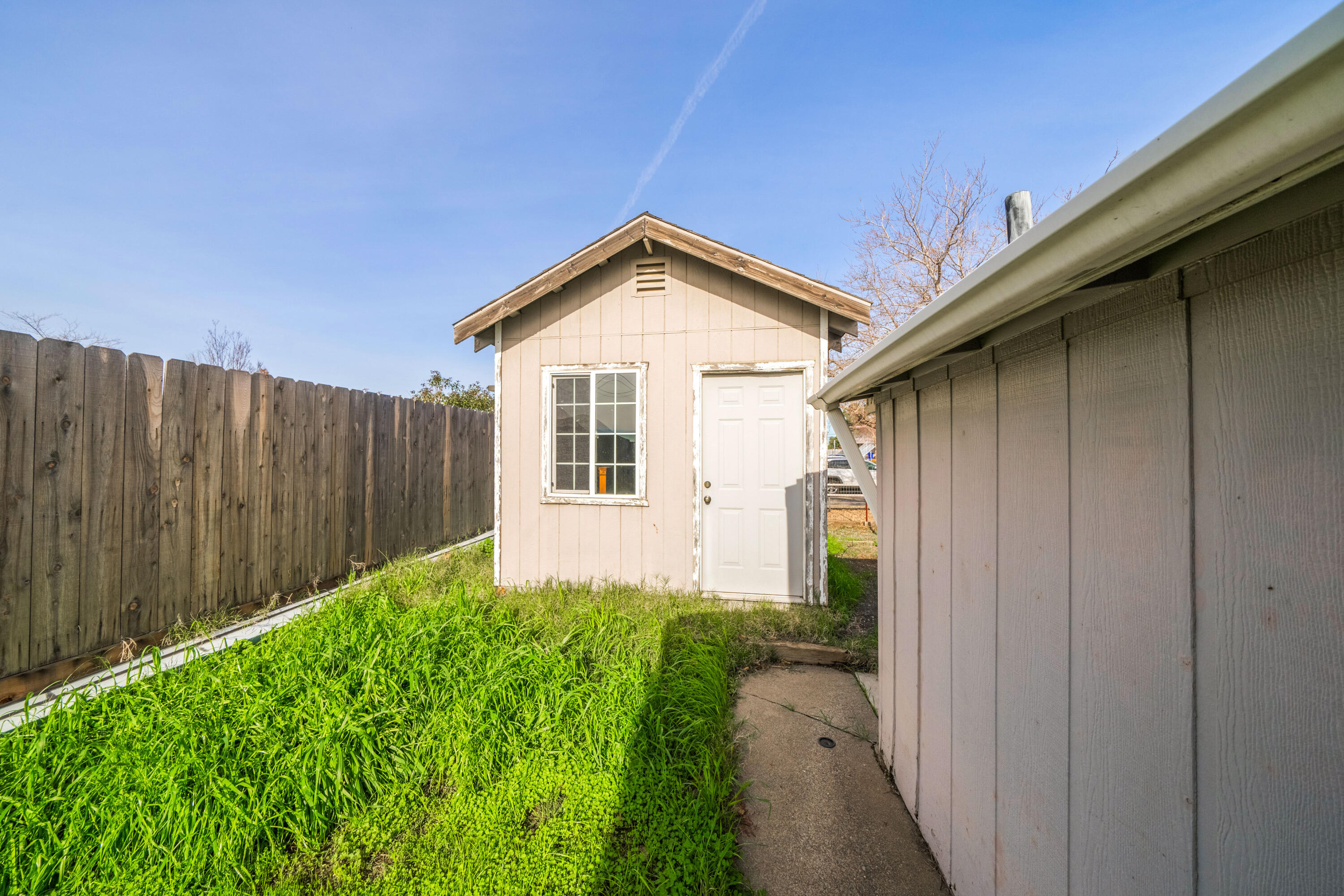 240 Kimball Road Red Bluff, CA 96080 - Photo 47 of 56 a view of a backyard with pathway