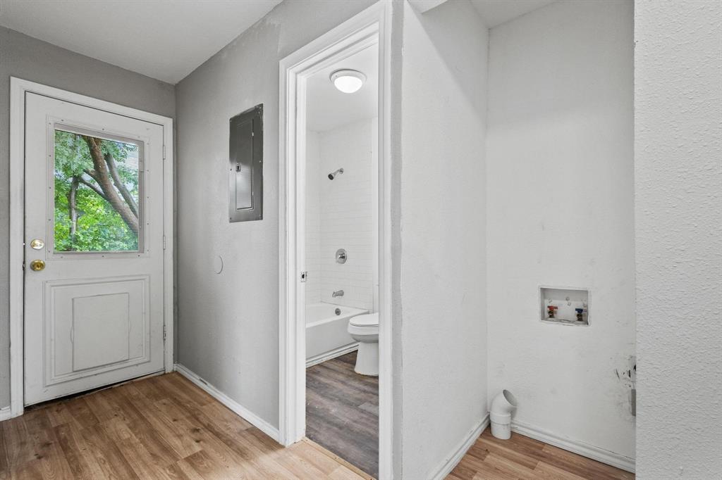 701 West Hull Street, Unit 1012 Denison, TX 75020 - Photo 12 of 20 wooden floor in a gallery