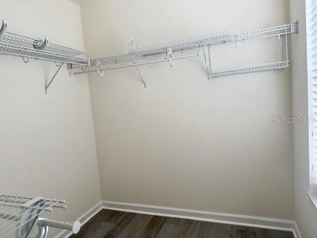 a view of a room with racks on the wall