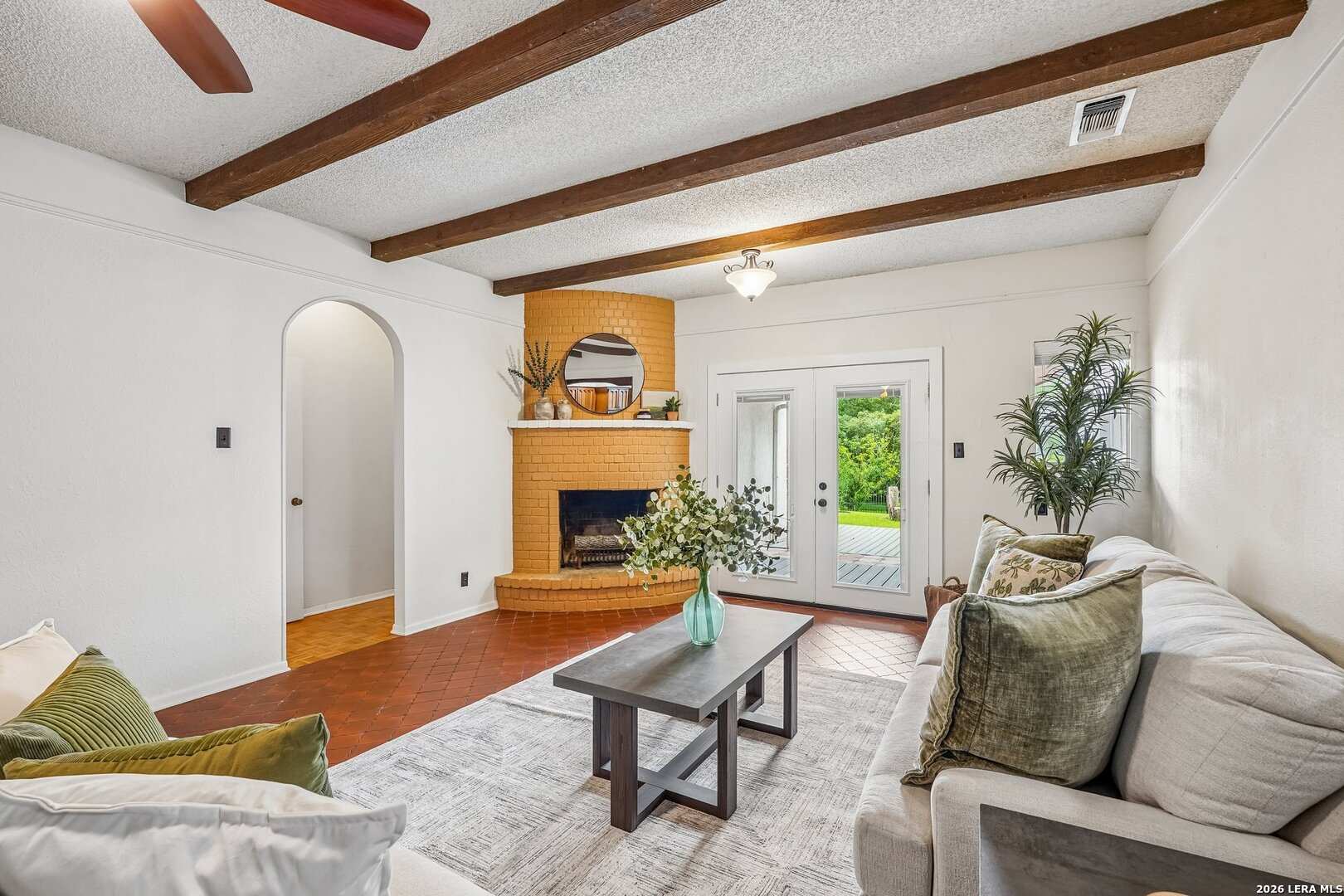 20632 Timber Rose Drive Garden Ridge, TX 78266 - Photo 9 of 46 a living room with furniture and a fireplace