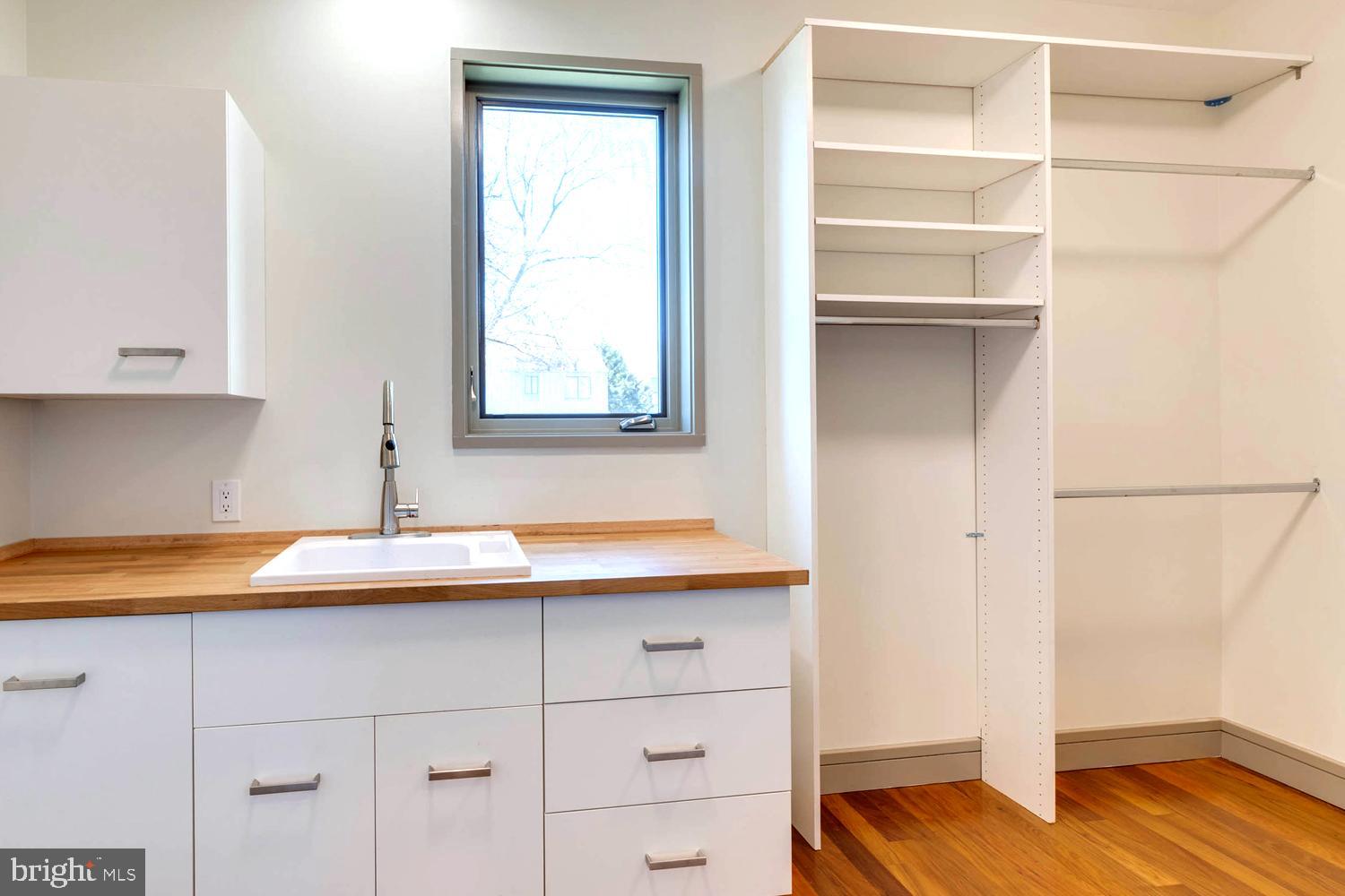 328 Hickory Point Road Pasadena, MD 21122 - Photo 19 of 49 Mudroom with Deep Garden Sink . Tiered Coat Rods