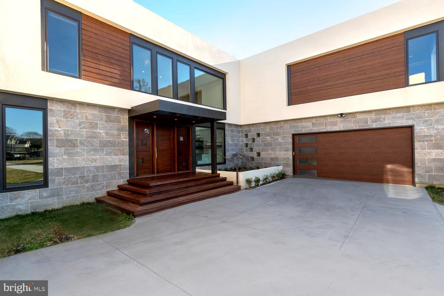 Exterior Italian Tile . Stucco . Brazilian Ipe