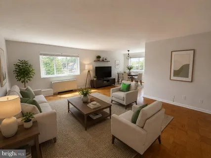 a living room with furniture a flat screen tv and a large window