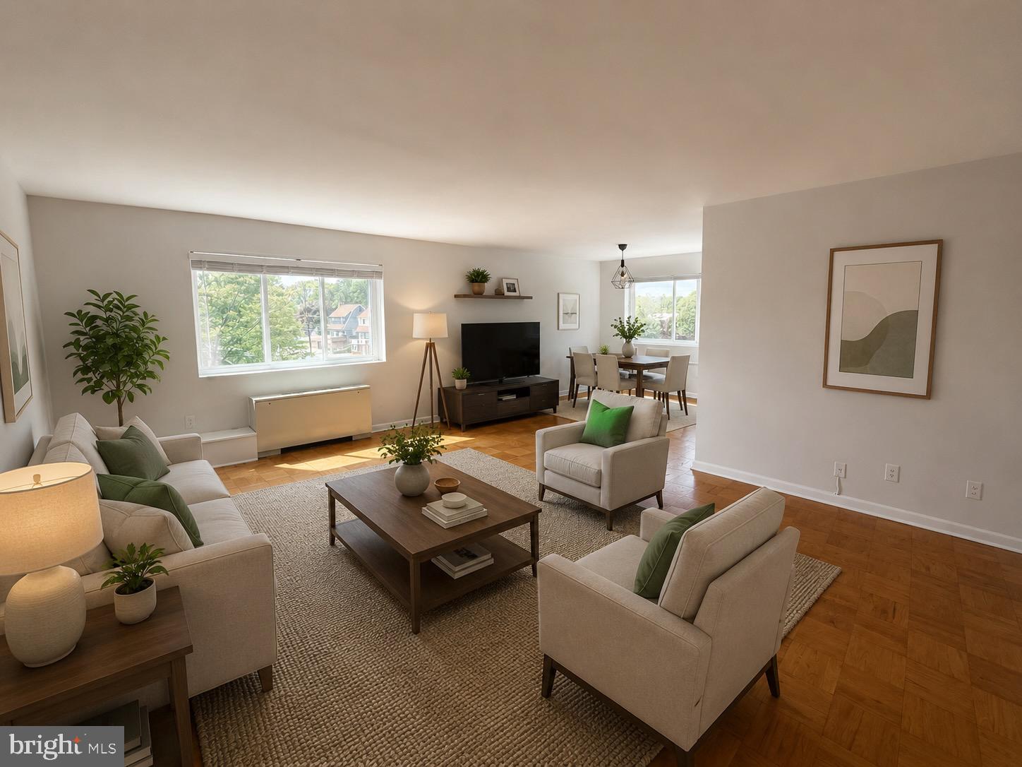 614 Sligo Avenue, Unit 411 Silver Spring, MD 20910 - Photo 1 of 24 a living room with furniture a flat screen tv and a large window