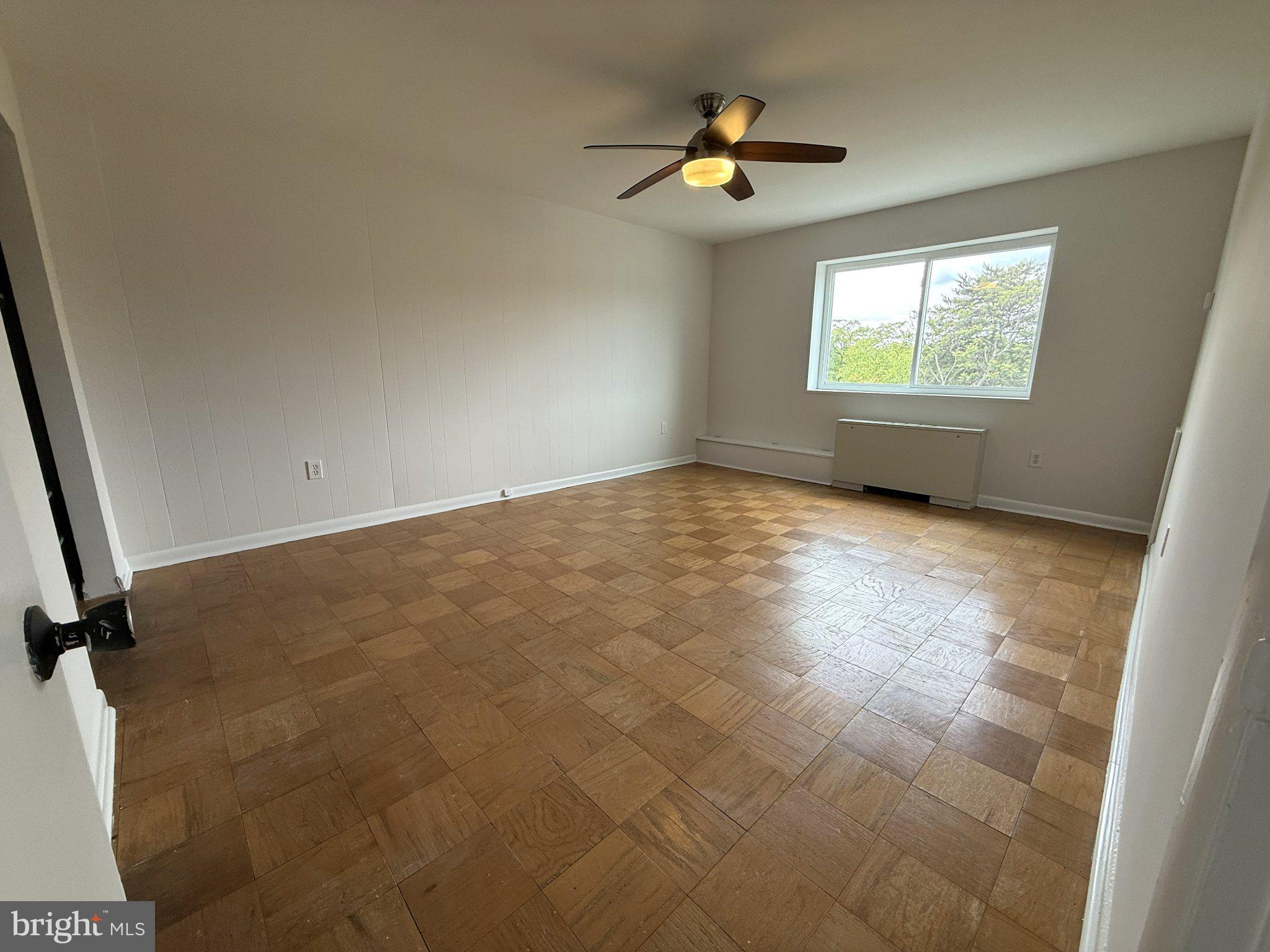 614 Sligo Avenue, Unit 411 Silver Spring, MD 20910 - Photo 14 of 24 an empty room with windows