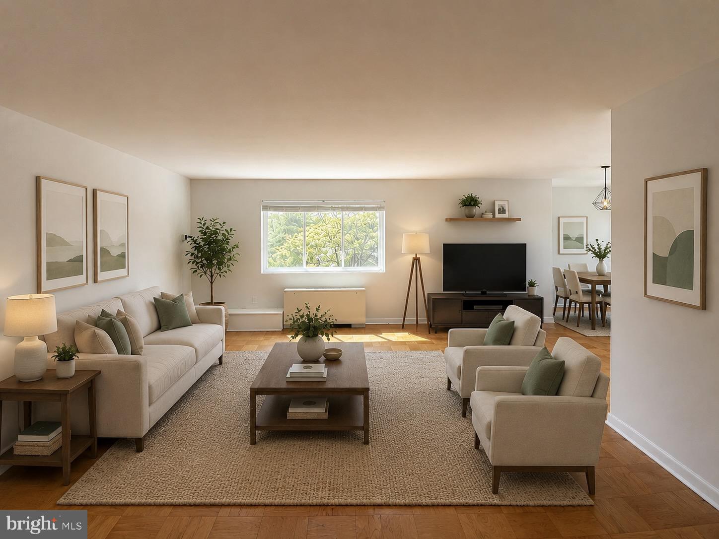 614 Sligo Avenue, Unit 411 Silver Spring, MD 20910 - Photo 3 of 24 a living room with furniture and a flat screen tv