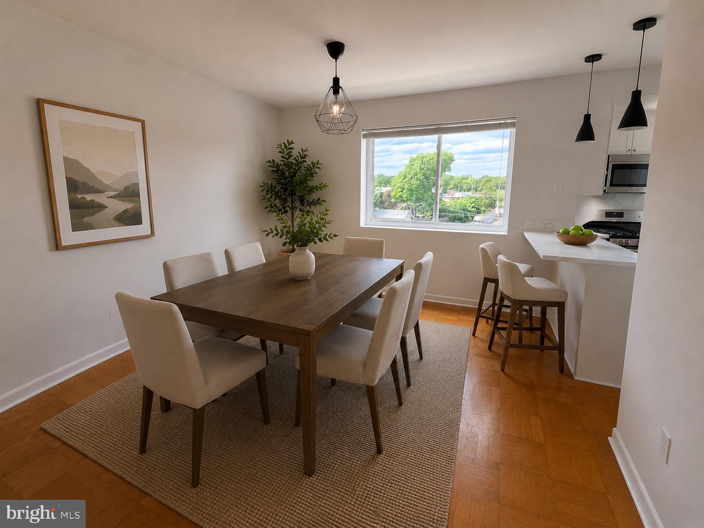 614 Sligo Avenue, Unit 411 Silver Spring, MD 20910 - Photo 5 of 24 a view of a dining room with furniture and window
