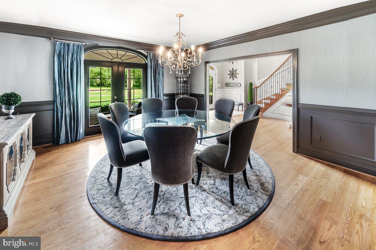 8170 Hollow Road Middletown, MD 21769 - Photo 18 of 67 a view of a dining room with furniture window and wooden floor