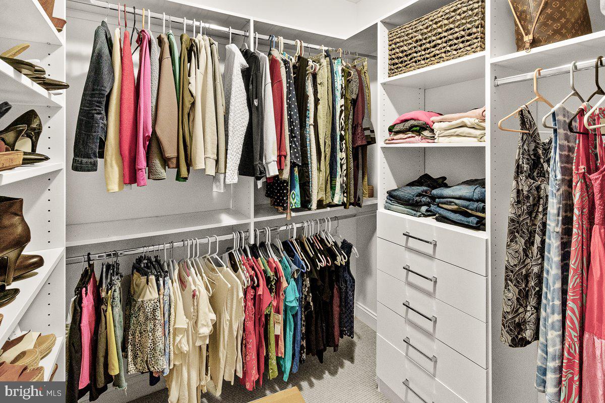 8170 Hollow Road Middletown, MD 21769 - Photo 30 of 67 a view of walk in closet with clothes