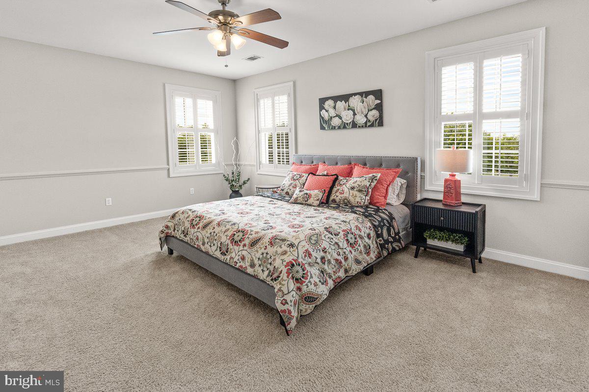 8170 Hollow Road Middletown, MD 21769 - Photo 37 of 67 a bedroom with a bed and a window