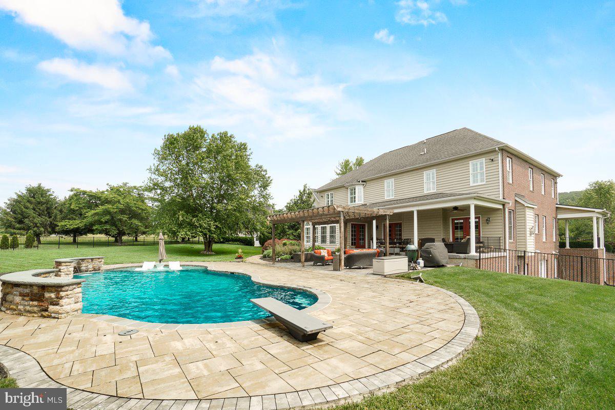 8170 Hollow Road Middletown, MD 21769 - Photo 51 of 67 a view of a house with swimming pool and sitting area