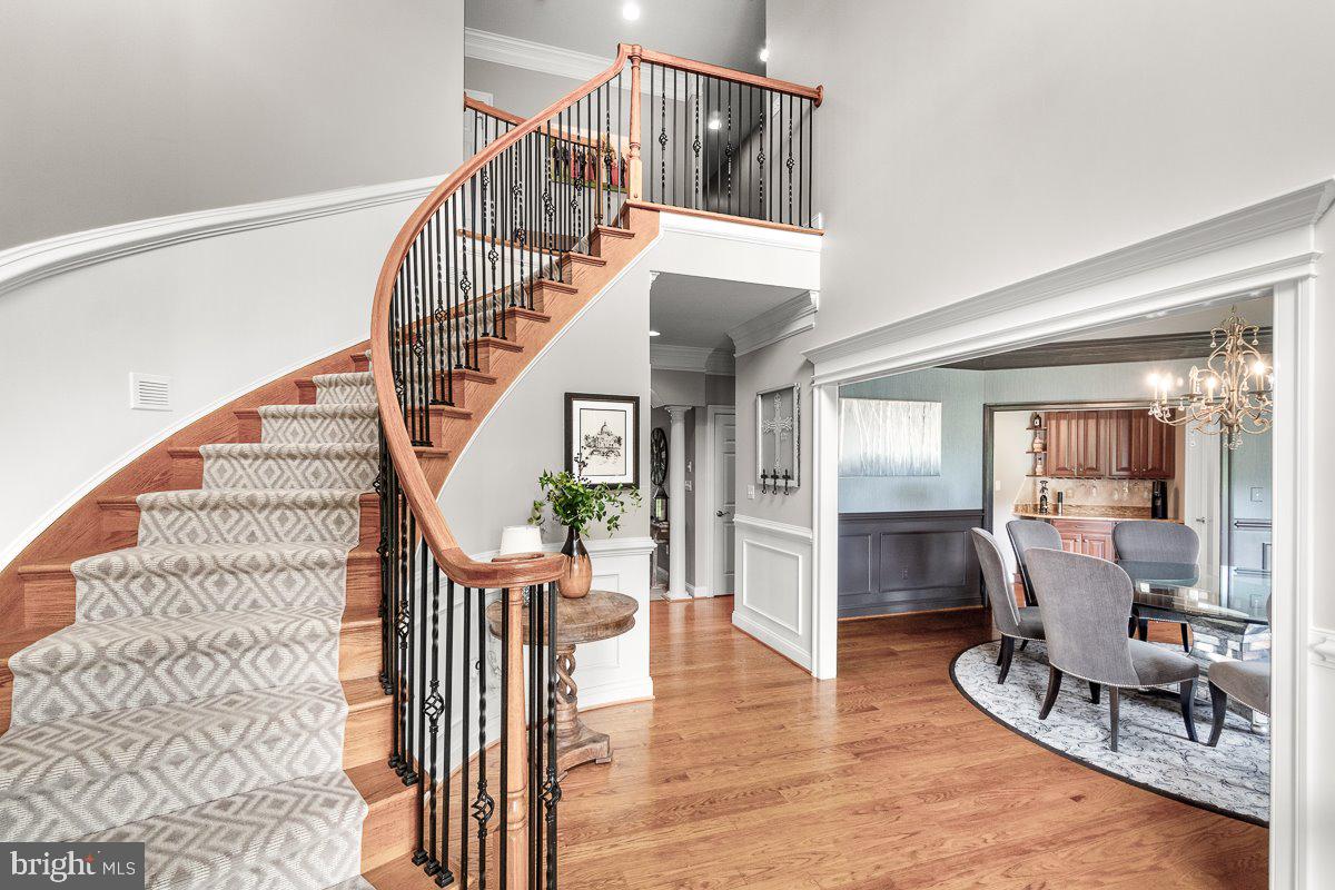 8170 Hollow Road Middletown, MD 21769 - Photo 6 of 67 a view of entryway livingroom and hall with wooden floor