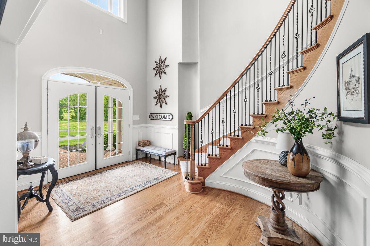 8170 Hollow Road Middletown, MD 21769 - Photo 7 of 67 a view of entryway and hall with wooden floor