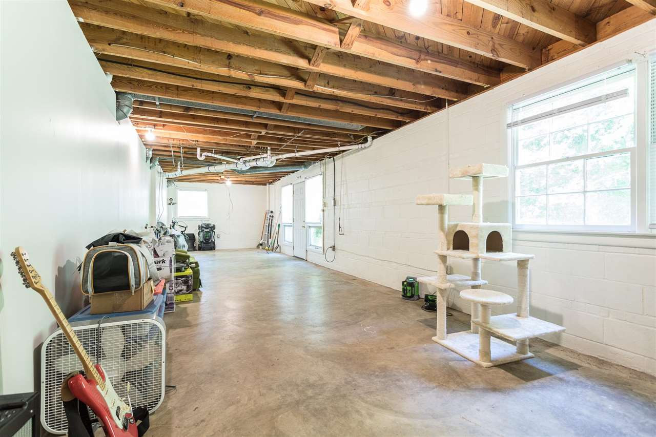 812 Cooper Road Raleigh, NC 27610 - Photo 25 of 29 Main basement space is an amazing flex area