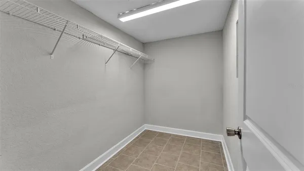 a view of a room with racks on the wall