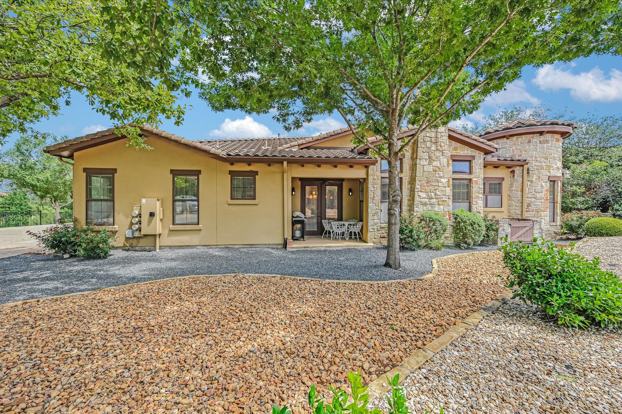 103 Rivalto Circle, Unit 1 Lakeway, TX 78734 - Photo 19 of 34 Yard area and patio