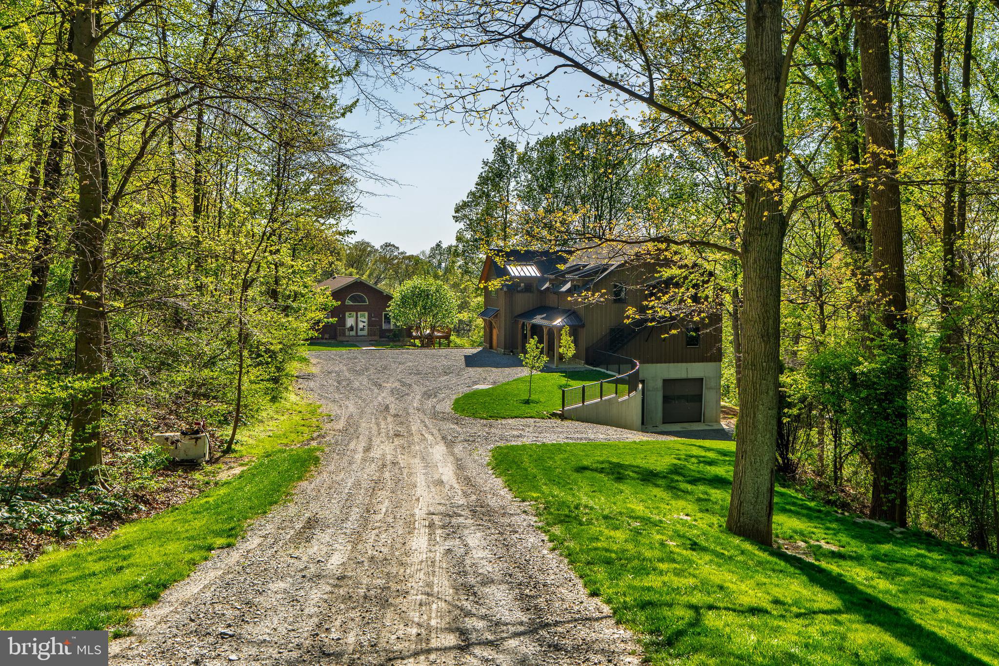 6309 Plank Road Narvon, PA 17555 - Photo 14 of 14 a view of a yard with plants and large trees